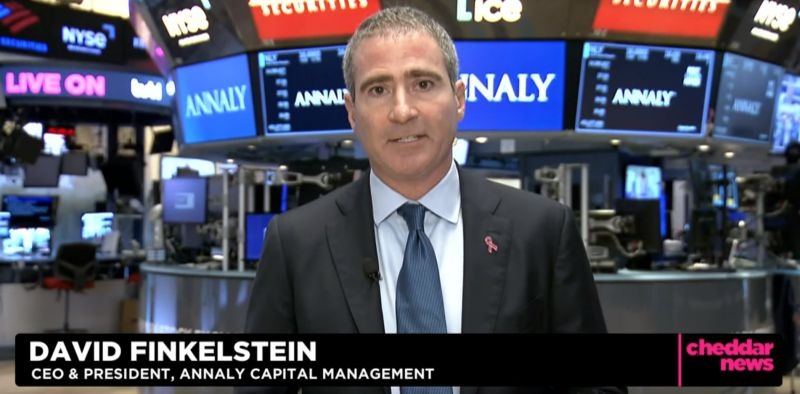 David Finkelstein speaking to Cheddar News from the New York Stock Exchange, with Annaly screens behind him