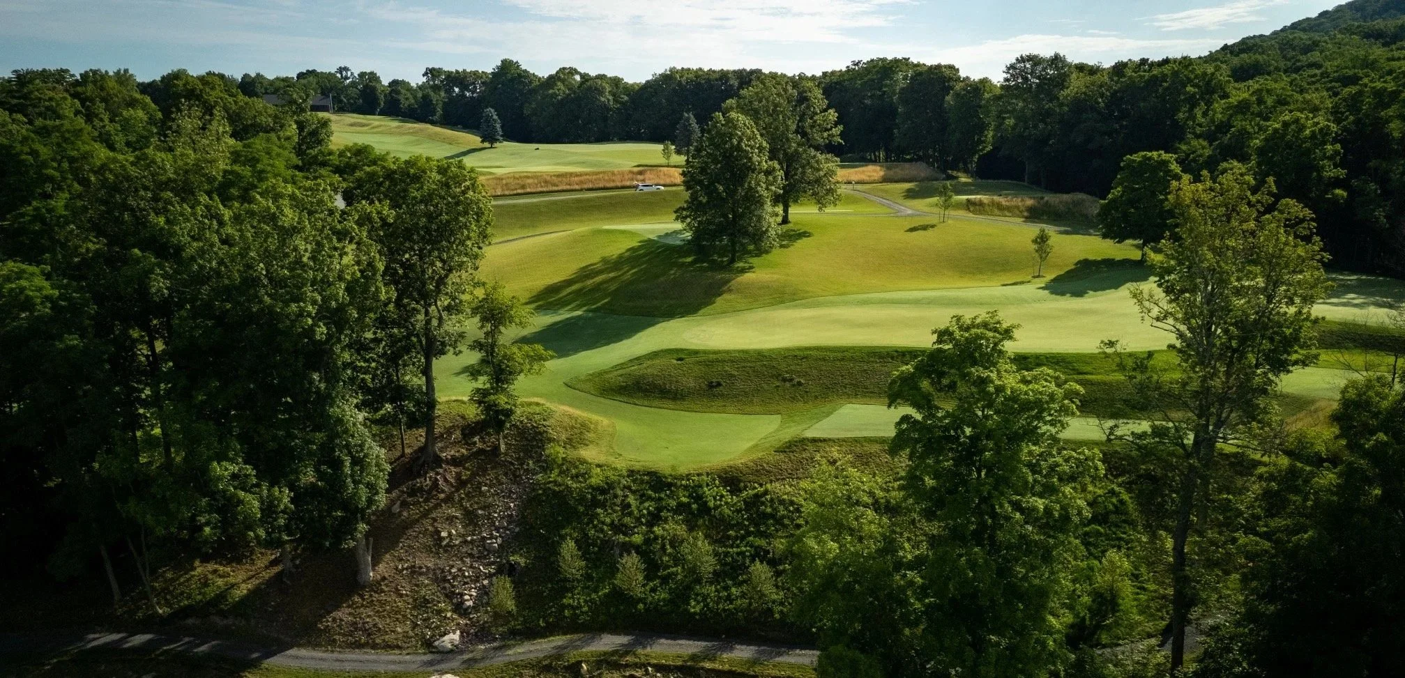 Storm King’s sculpted greens and bunkers across a rolling landscape