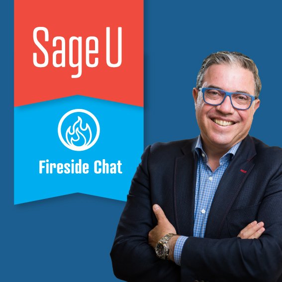 David Gorodetski beside the red and blue Sage U Fireside Chat banner