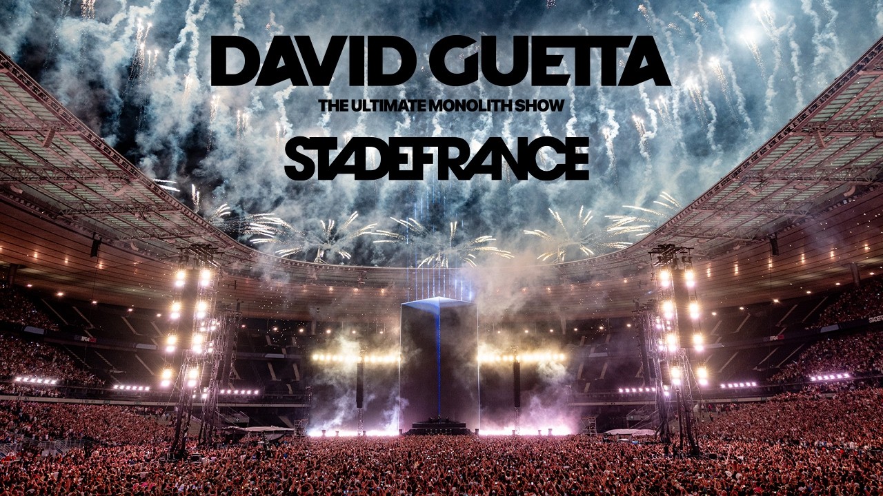 A packed Stade de France surrounds the black Monolith stage during David Guetta’s 2026 Paris show