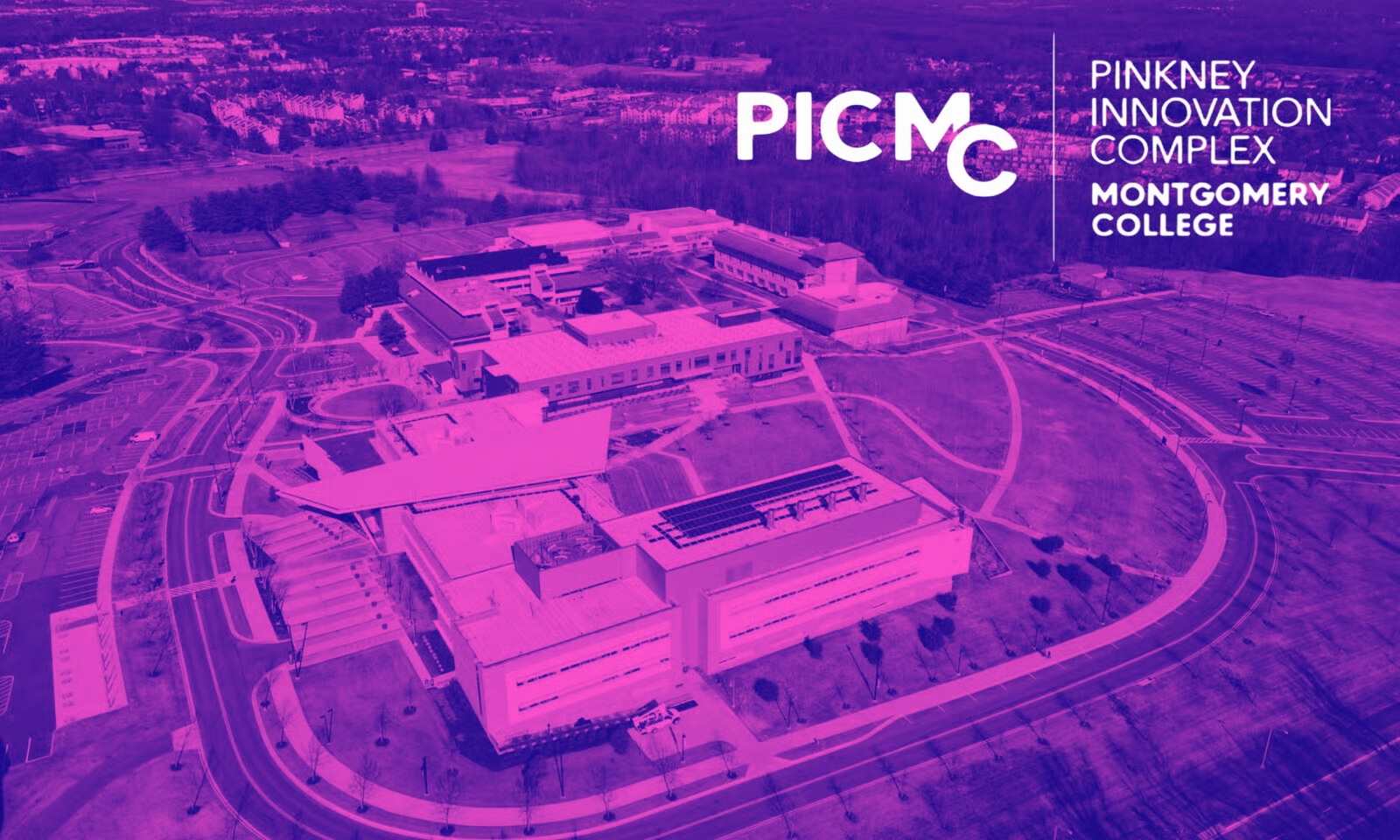 A purple-tinted aerial view of Montgomery College’s Pinkney Innovation Complex campus