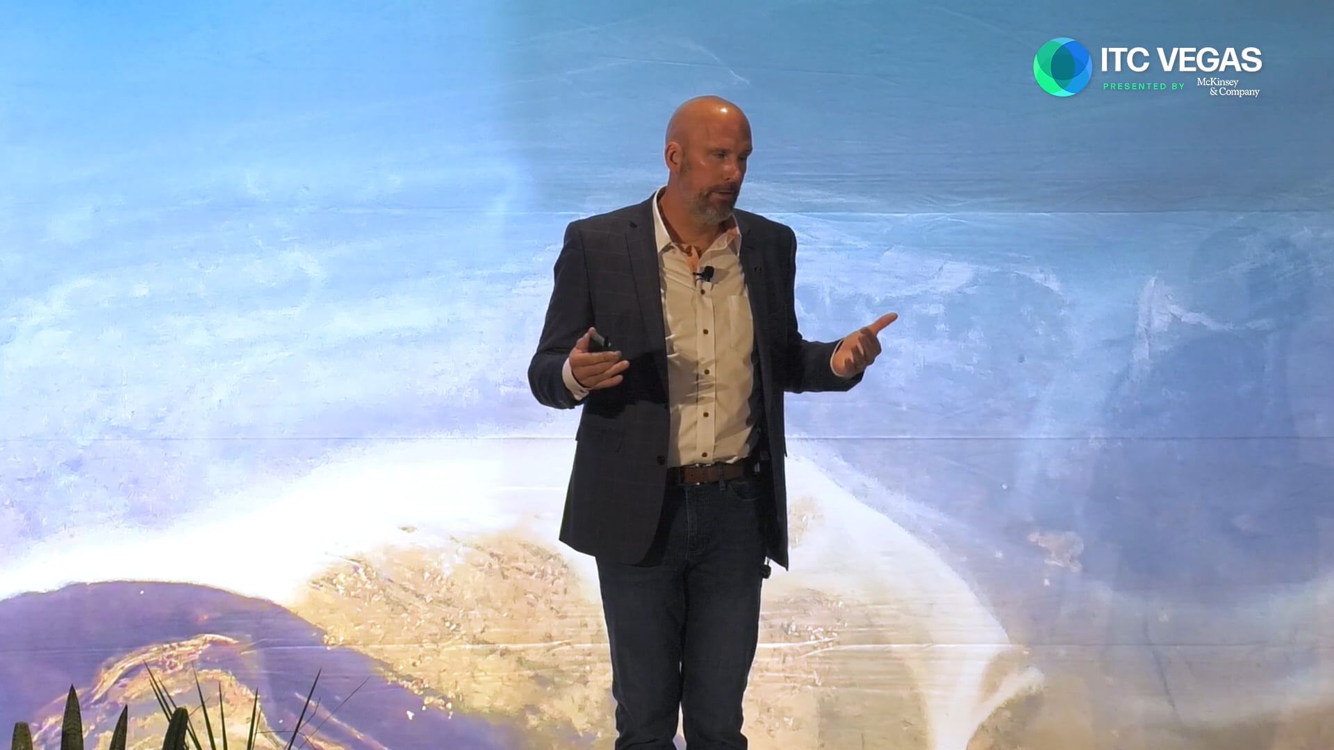 David Howland speaking onstage at ITC Vegas in 2023