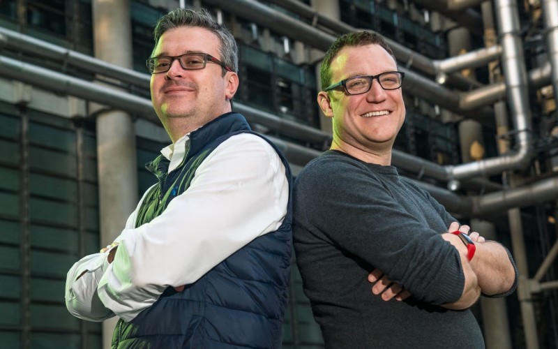 Coincover co-founders David Janczewski, left, and Adam Smith standing back to back