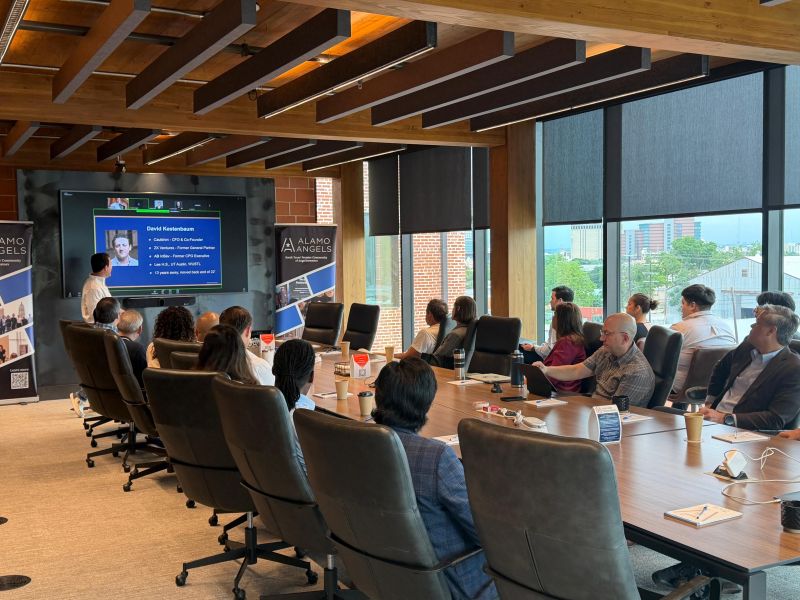 Attendees around a conference table during David Kestenbaum's Alamo Angels investing masterclass in San Antonio