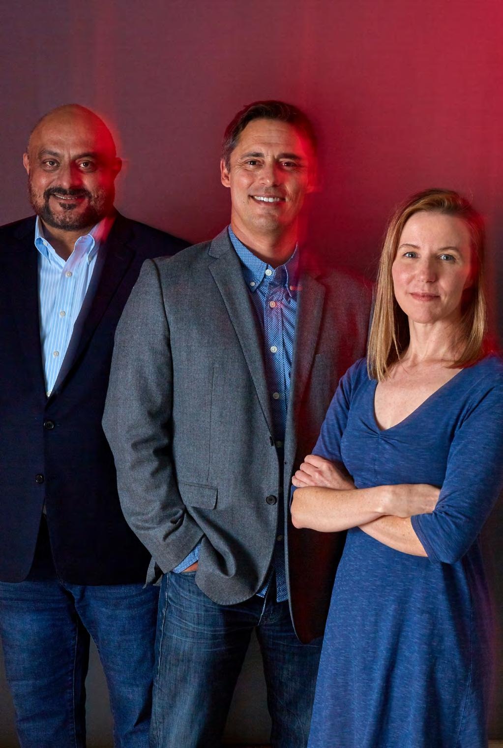 Preet Virk, David Lazovsky and Michelle Tomasko standing together in a 2020 founders photograph