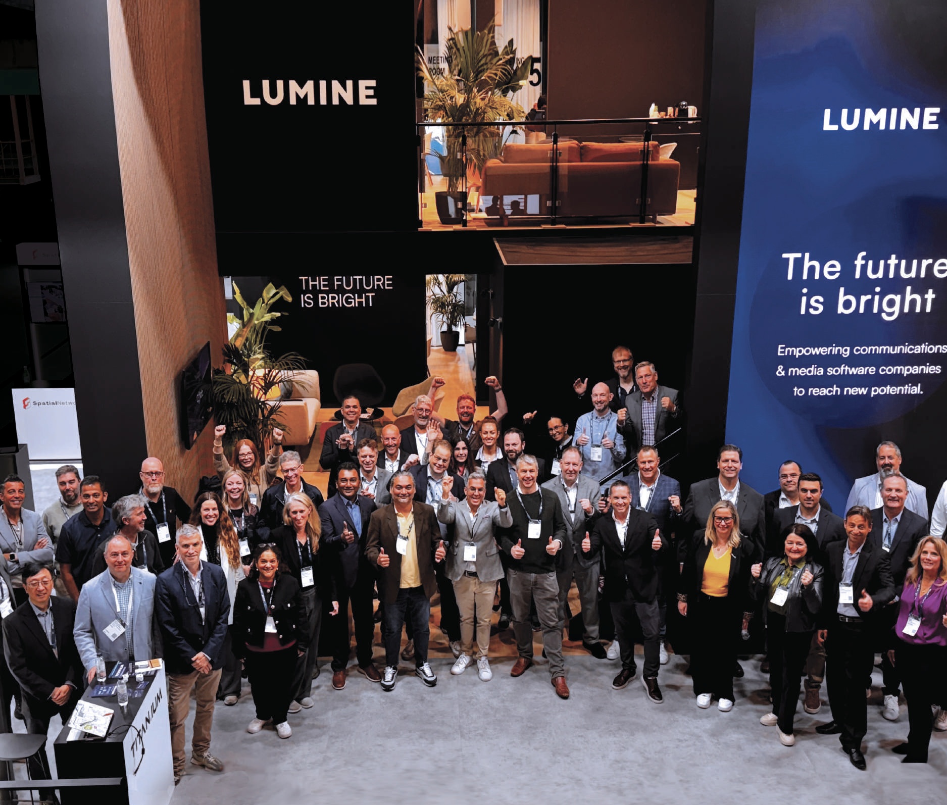 Lumine colleagues gathered at the company pavilion at Mobile World Congress