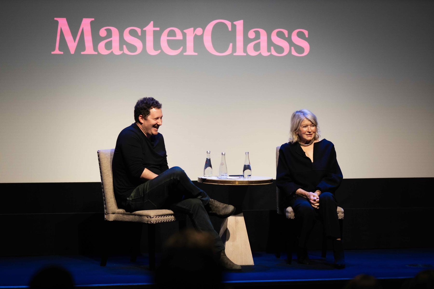 David Rogier and Martha Stewart seated onstage in conversation