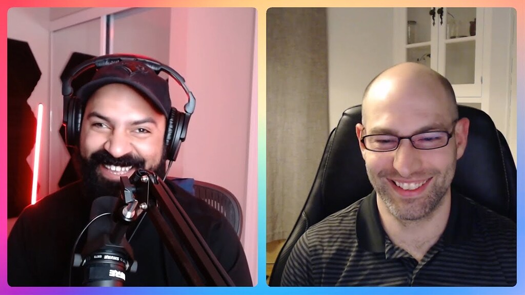 David Shapiro, on the right, smiling during a remote podcast conversation in 2022