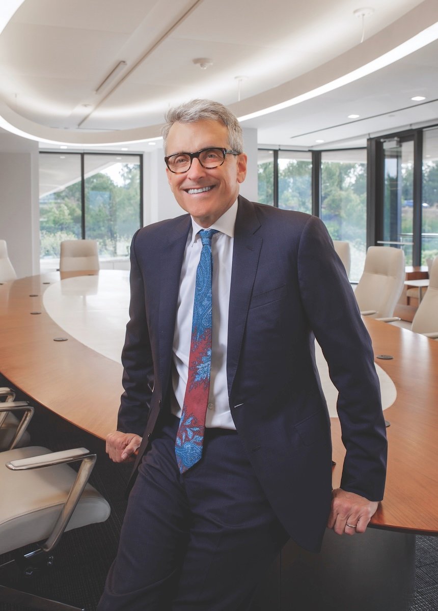 David Spector standing beside a conference table at Pennymac’s Westlake Village offices