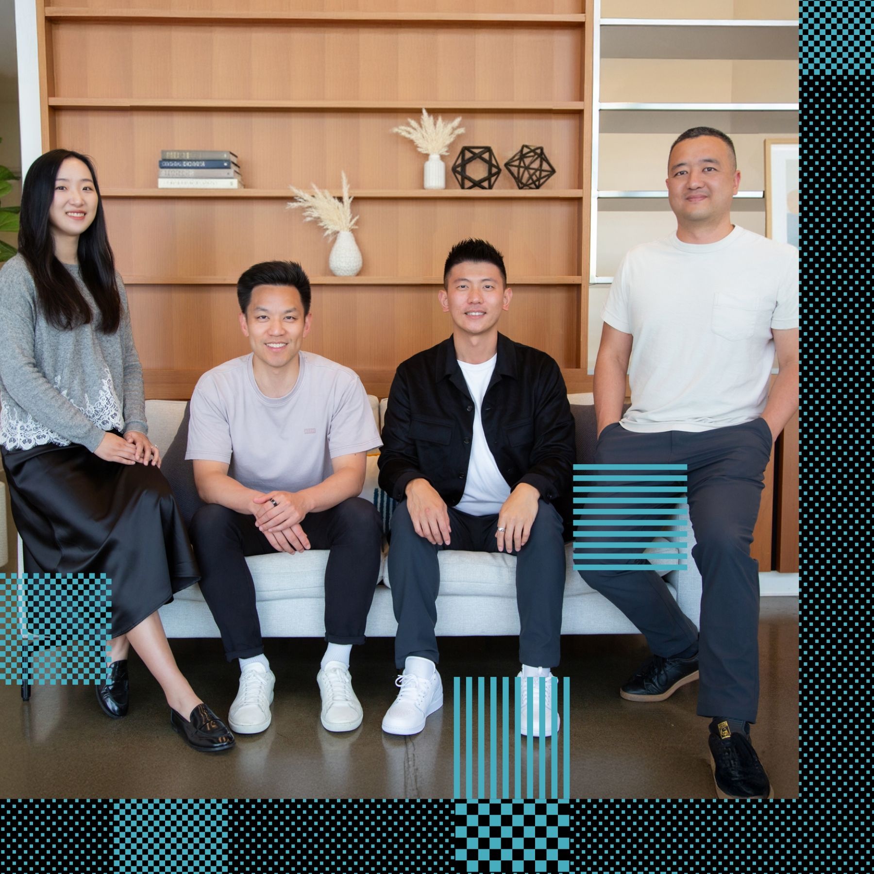 Reevo’s four co-founders together, with David Zhu seated in a black jacket