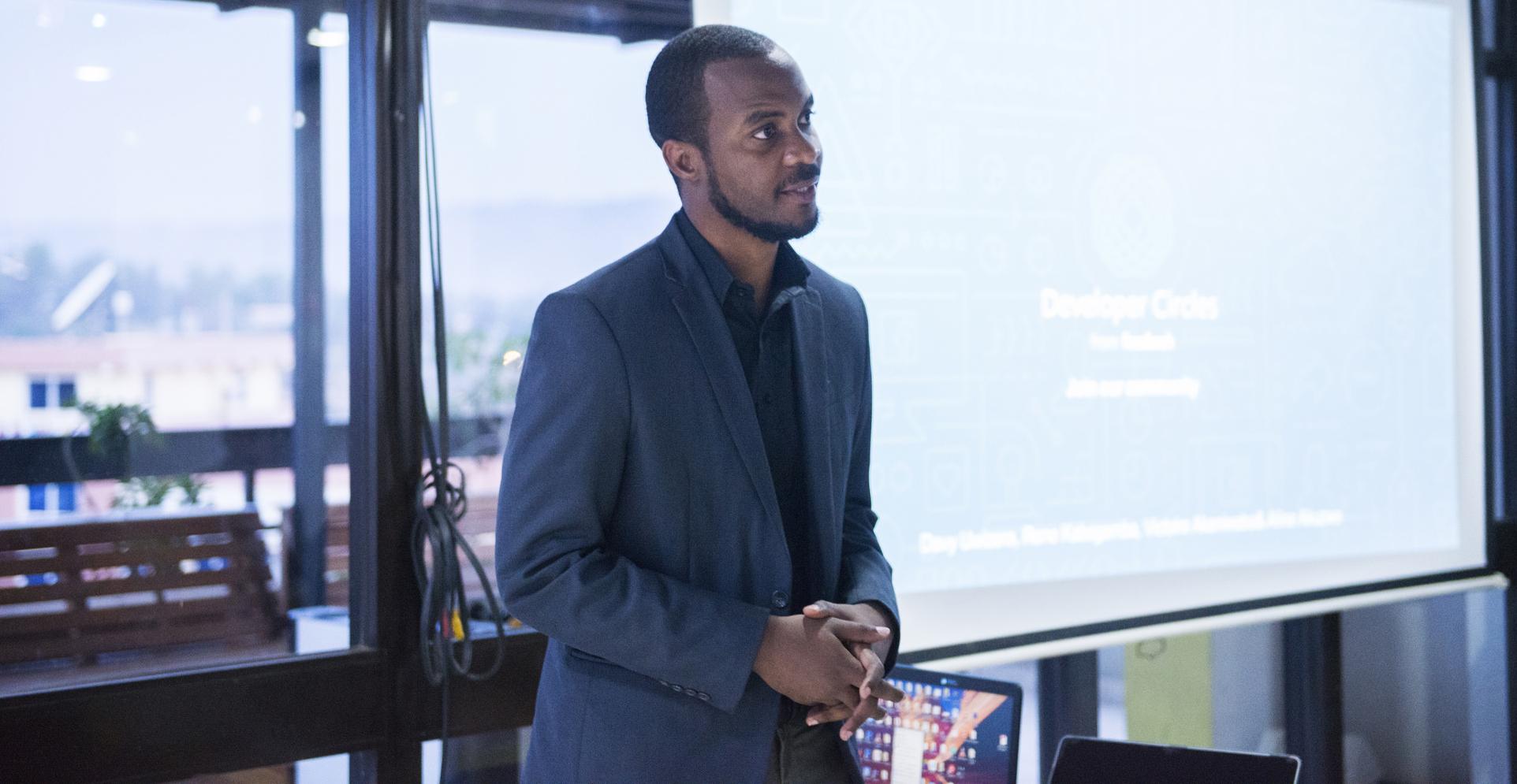 Davy Uwizera speaking at the launch of Kigali Developer Circle in 2017