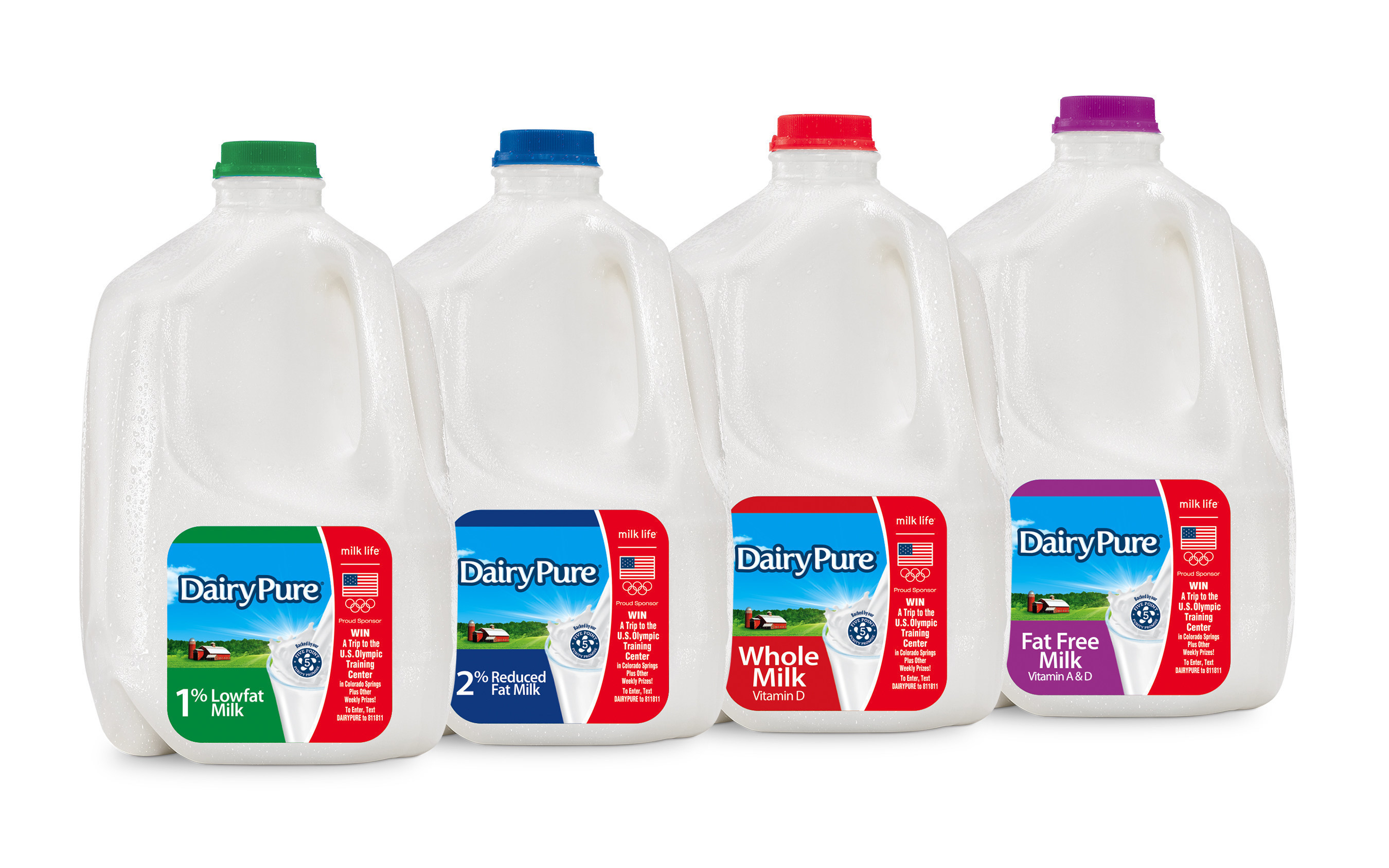 Four DairyPure gallon milk bottles with different cap colors and 2016 Milk Life Team USA promotional labels