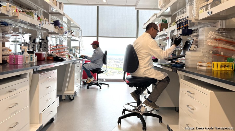 Deep Apple Therapeutics scientists working at a laboratory bench
