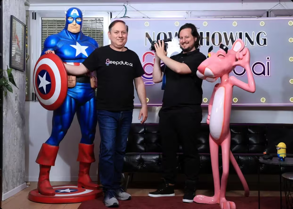 Deepdub’s founders standing between Captain America and Pink Panther figures