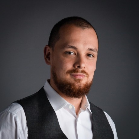 Portrait of P. Michael Ossareh, identified in professional histories as a Rah co-founder