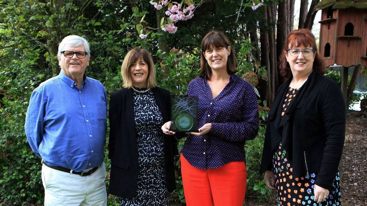 Deirdre Mortell, second from right, holding her Cork Person of the Month award beside Manus O’Callaghan, Anne Brown and Ann-Marie O’Sullivan