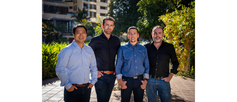 Deliverect’s four co-founders standing together outdoors