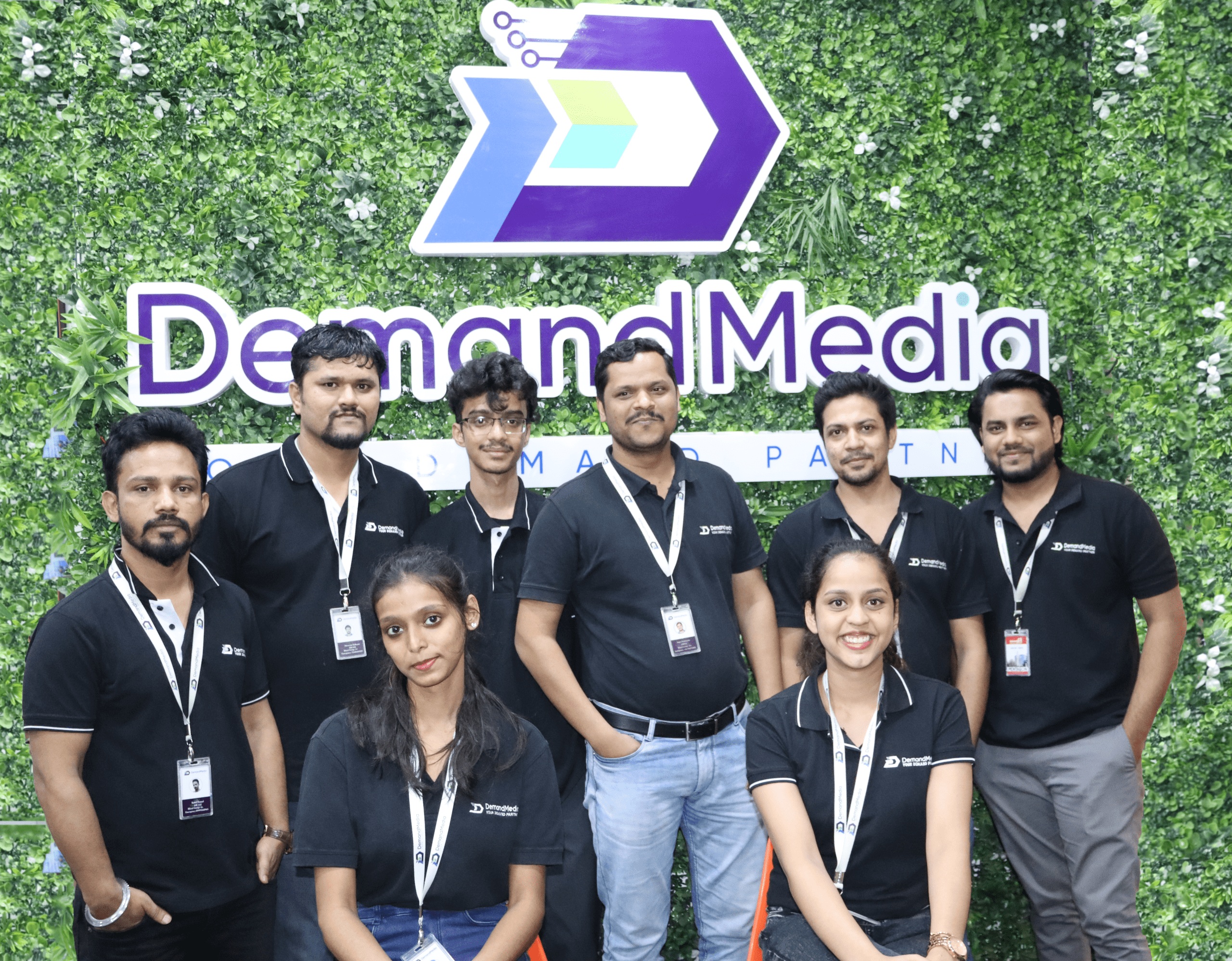 Demand Media BPM team members posing together in a photograph published on the company’s About page