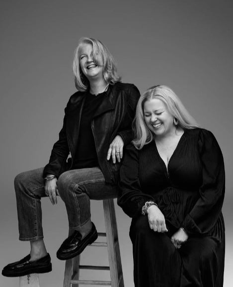 Thyme Sullivan and Denielle Finkelstein, the co-founders of UNICORN in every stall, laughing together