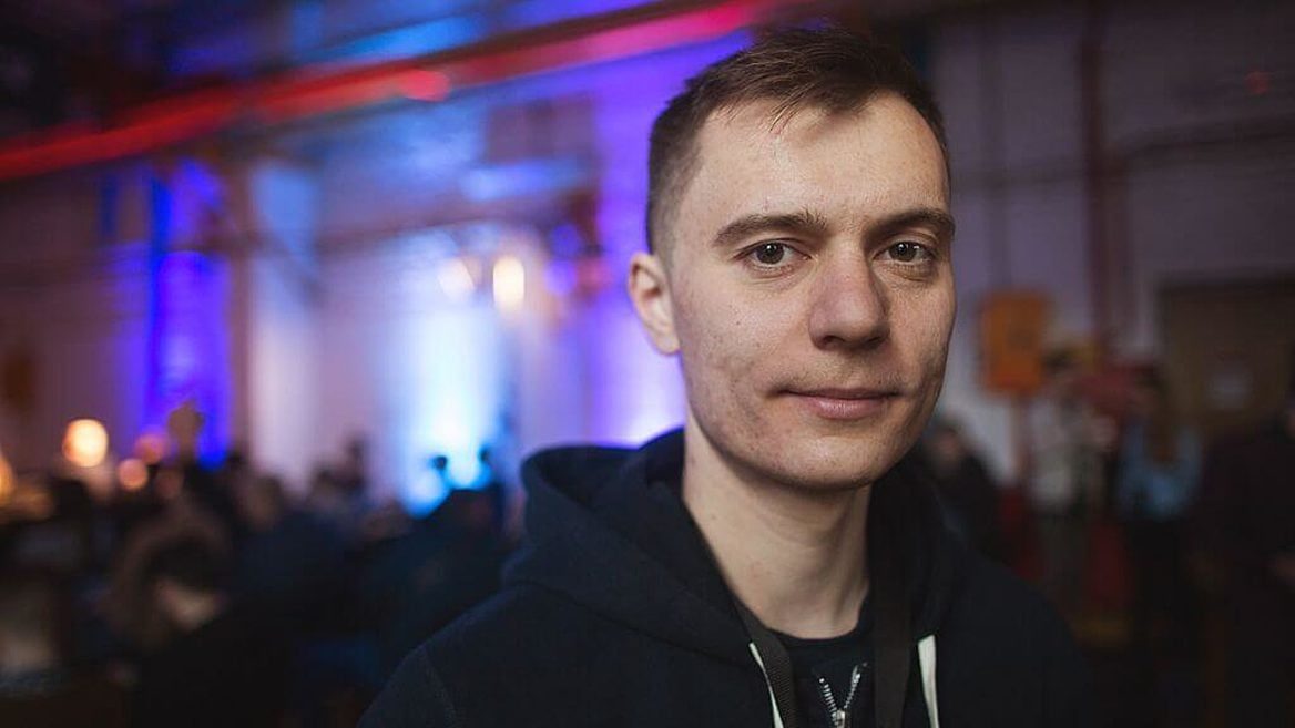 Denis Yarats wearing a dark hoodie at a technology event