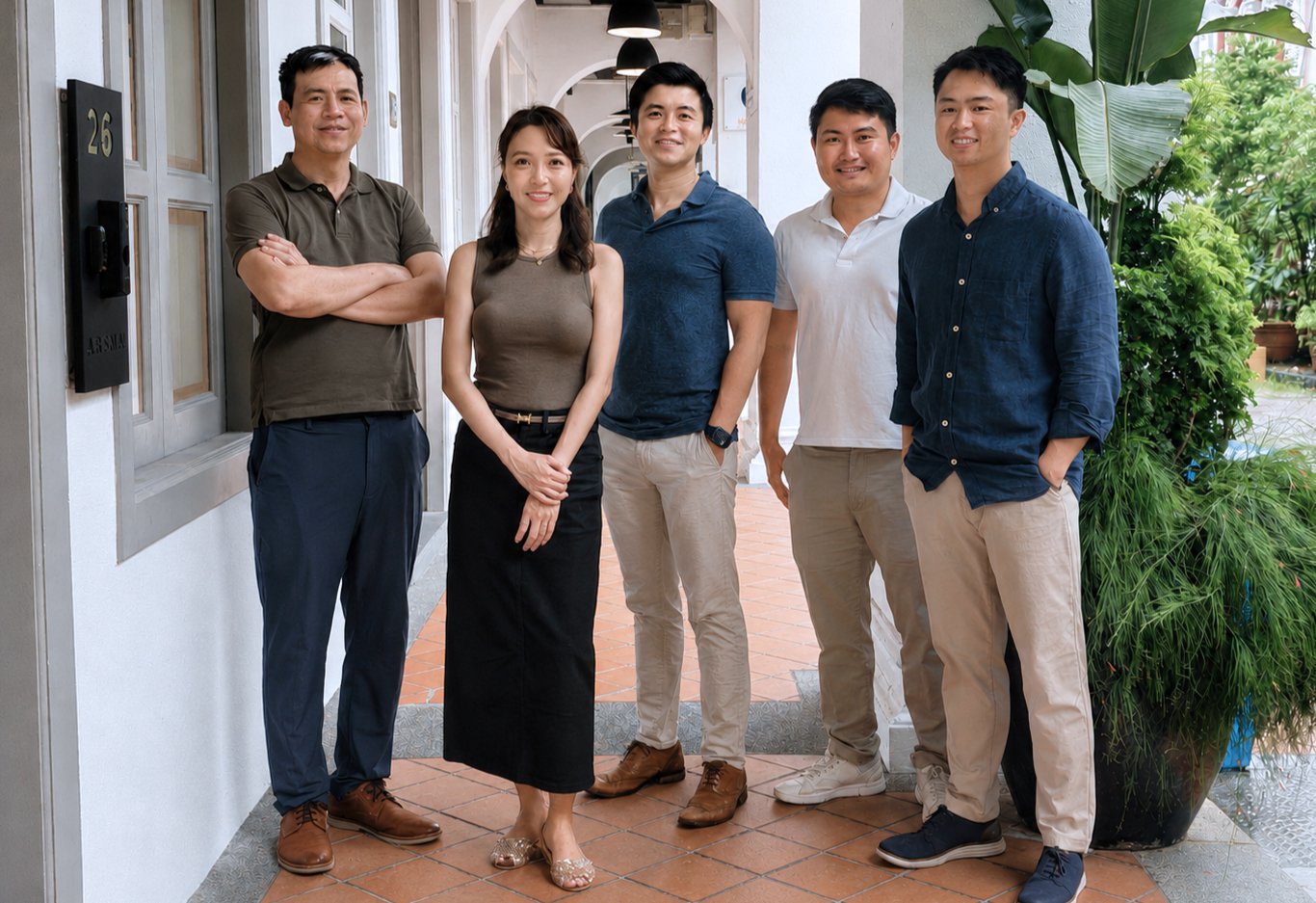 Dennis Chua, centre, with four Timah Partners colleagues outside their Singapore office