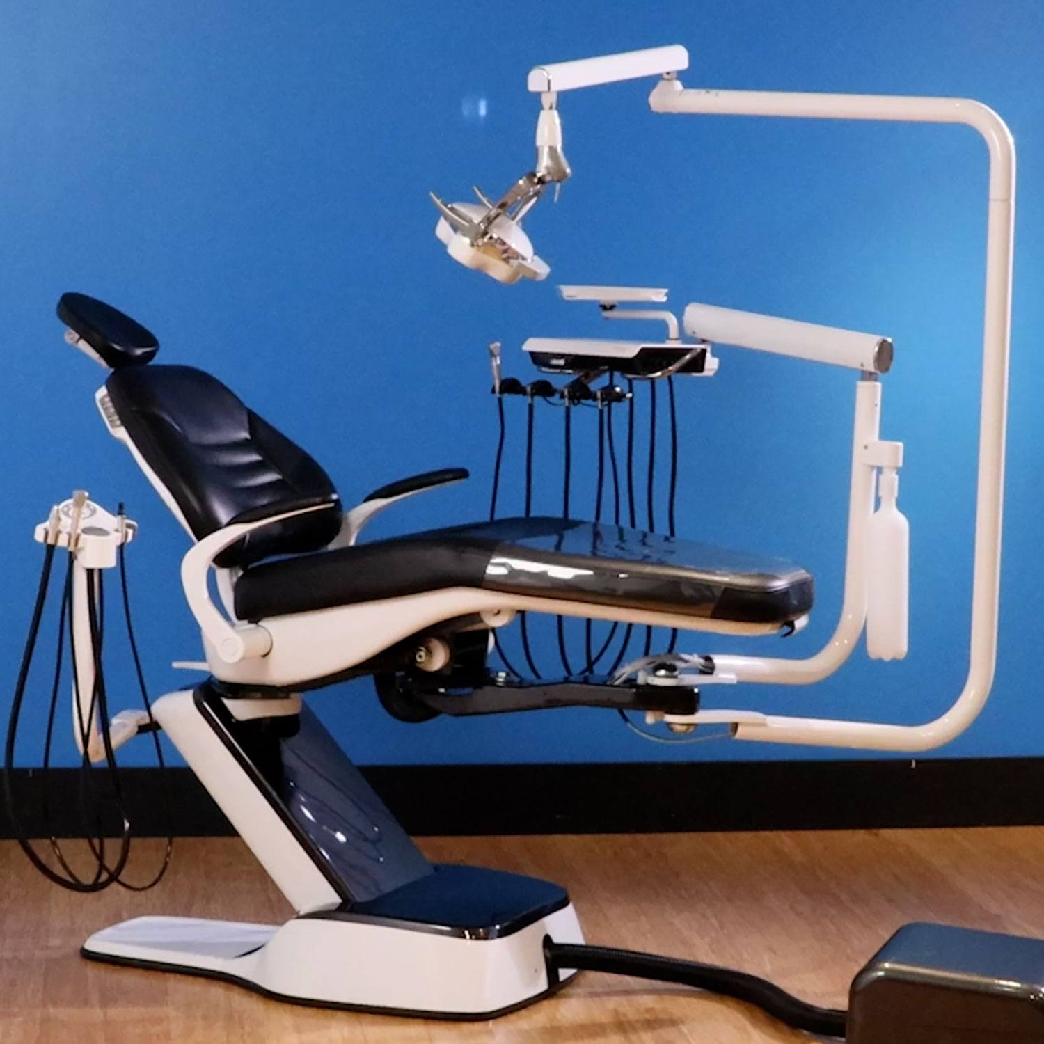 A blue Forest 6400 dental patient chair in a blue treatment-room setting