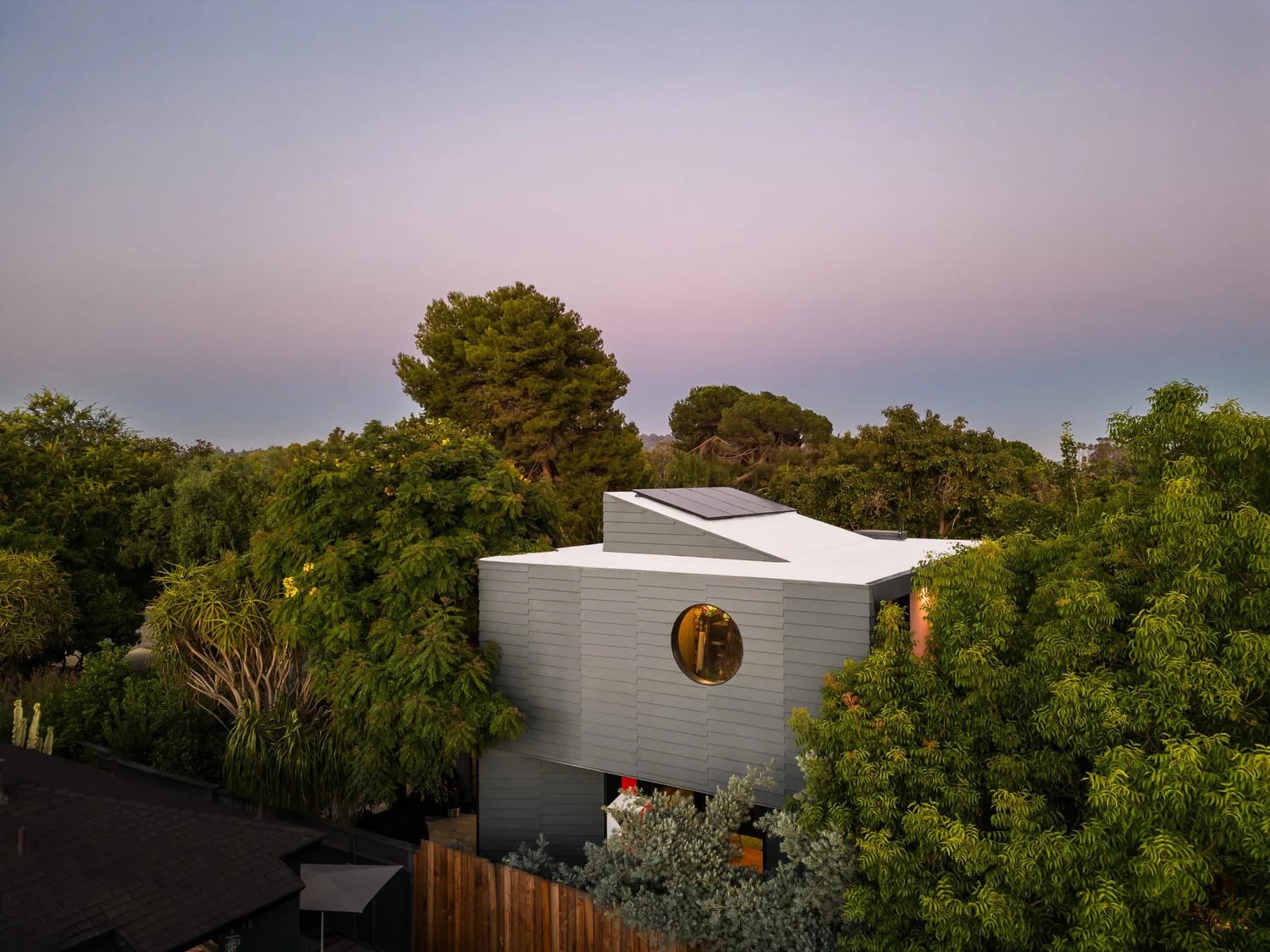 Atwater House by Design, Bitches, surrounded by trees