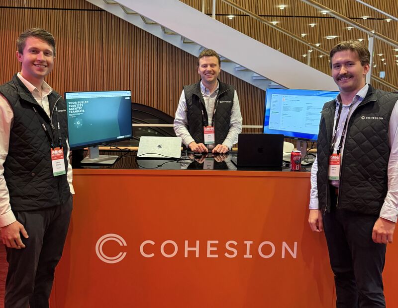 Devon Krapcho, Matthew McBrien and Matt Munns at the Cohesion display during the Sohn Conference in New York