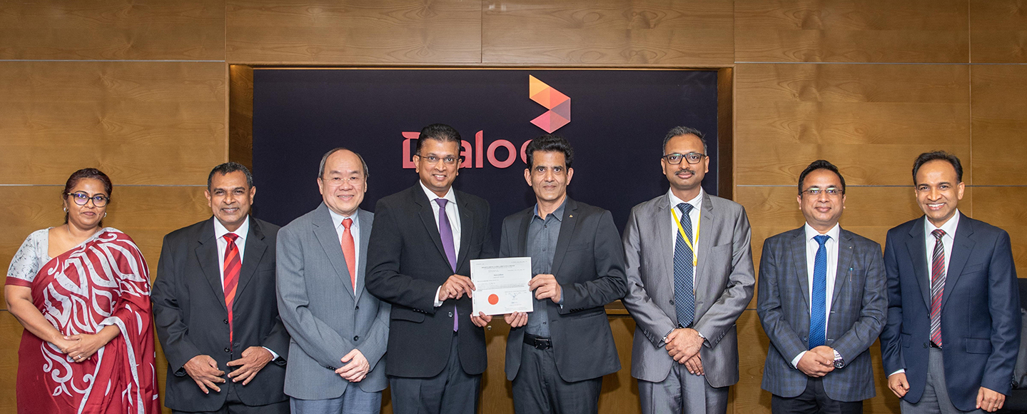 Dialog and Airtel representatives at the June 2024 transaction closing