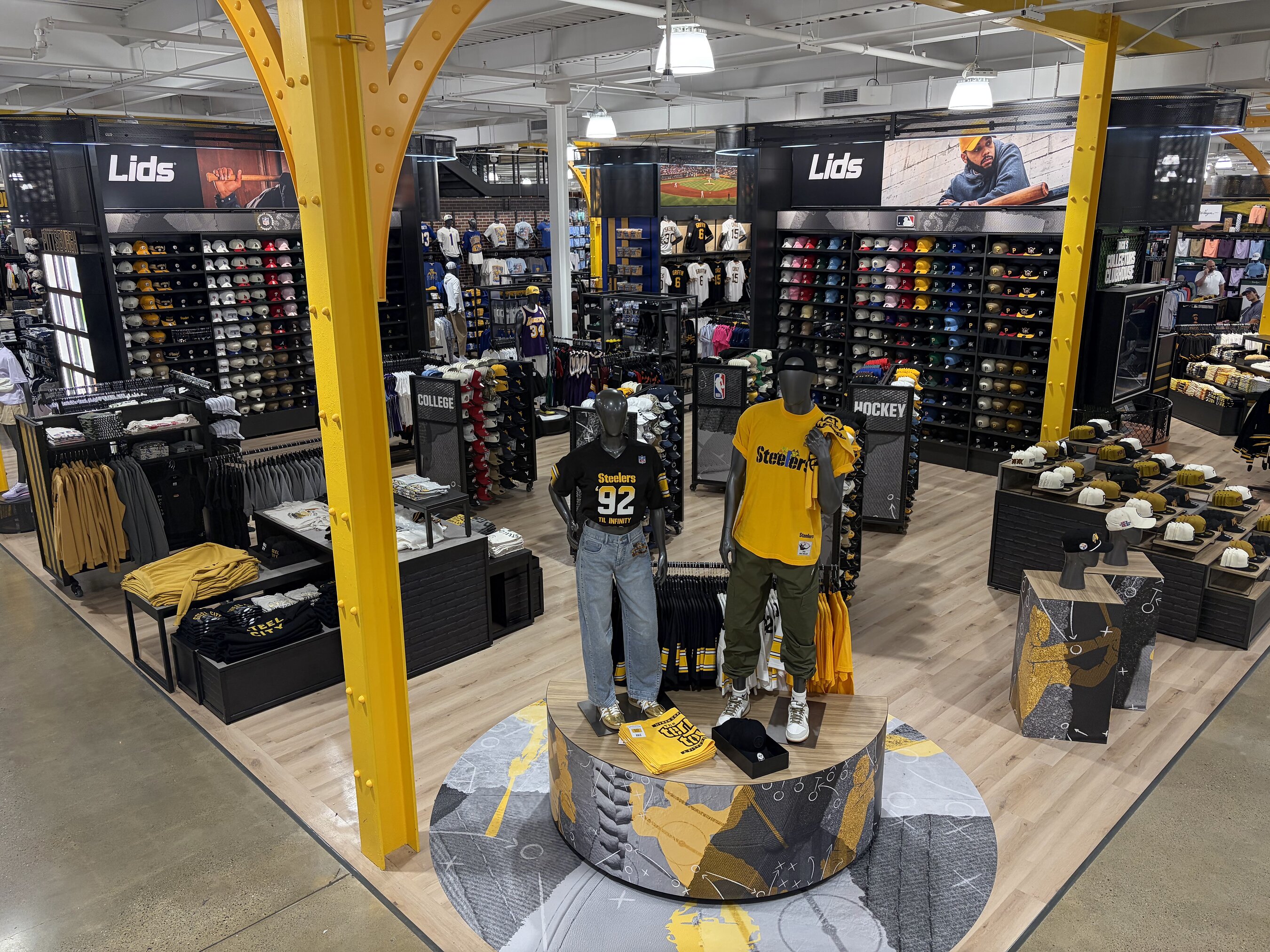 Lids cap displays and Pittsburgh team apparel inside a DICK’S store