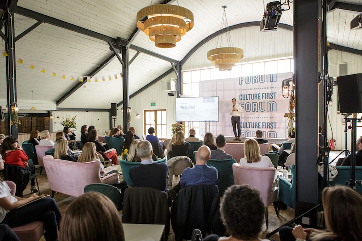Didier Elzinga speaking to seated participants at a Culture First Forum