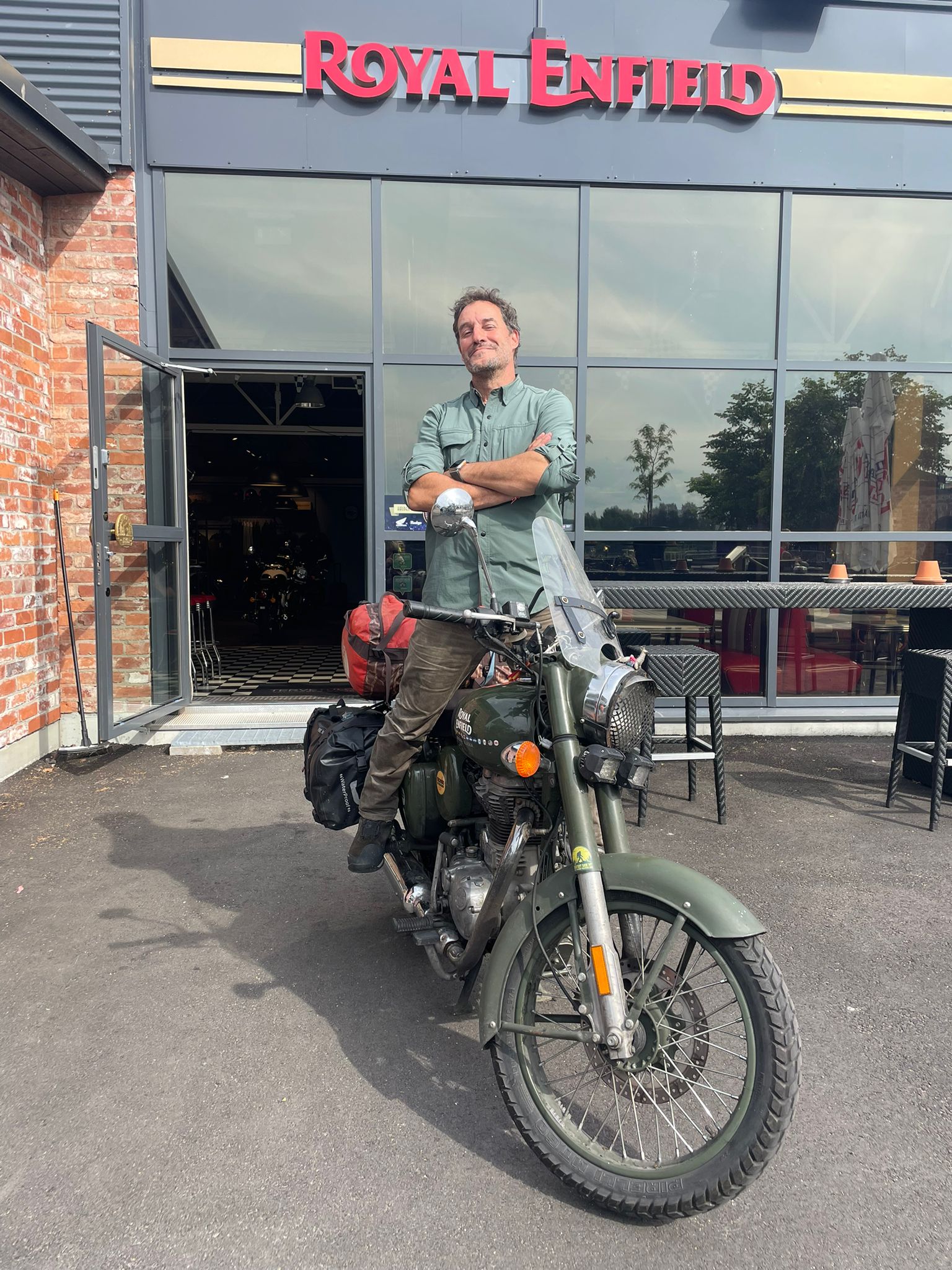 Diego Rosón with Frankie outside a Royal Enfield premises during his Finnish arrival