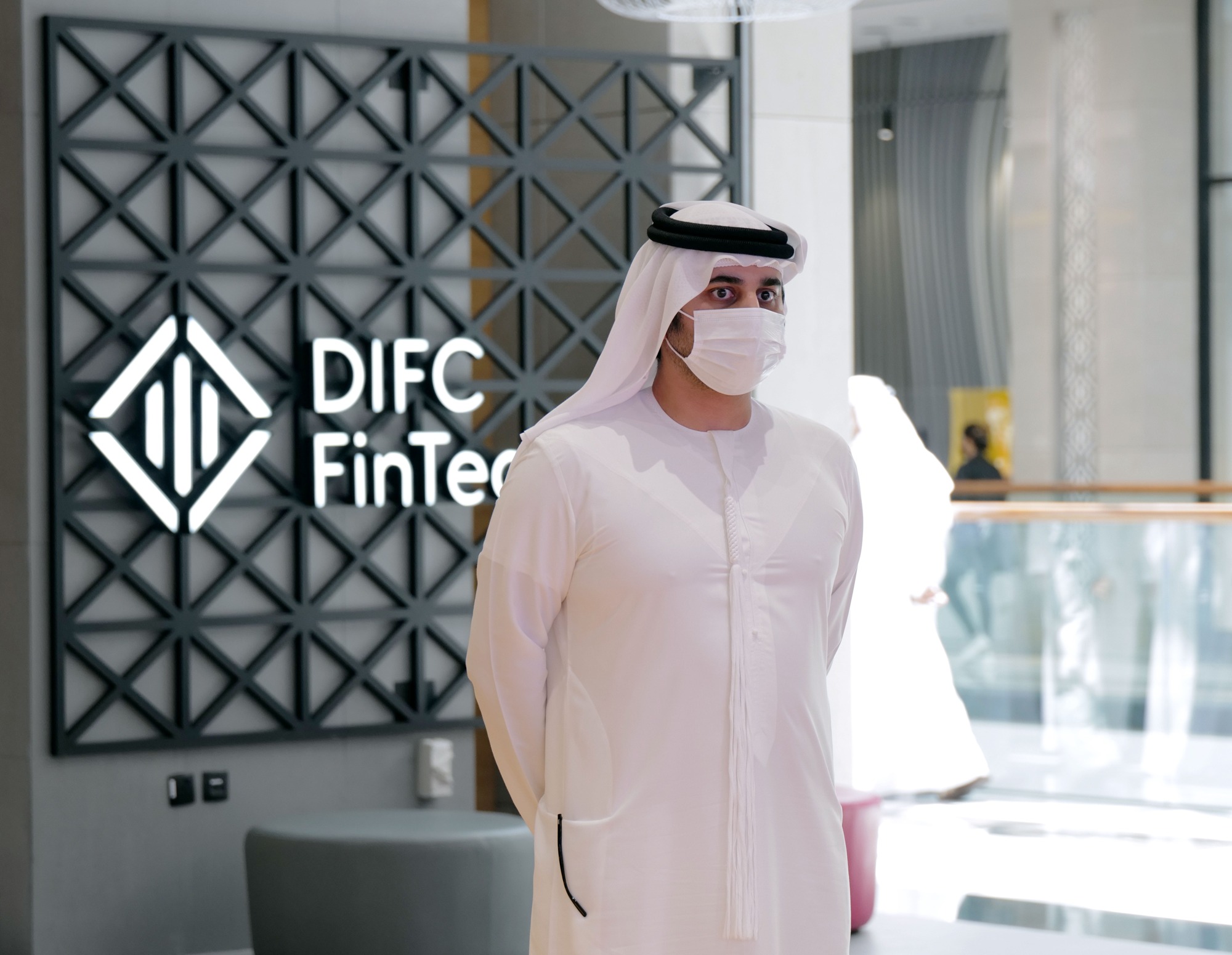 Official inauguration photograph at DIFC, with FinTech signage behind a visiting official