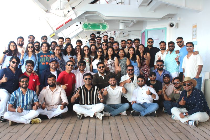 Wishtree colleagues gathered on a ship’s deck during their 2026 team offsite