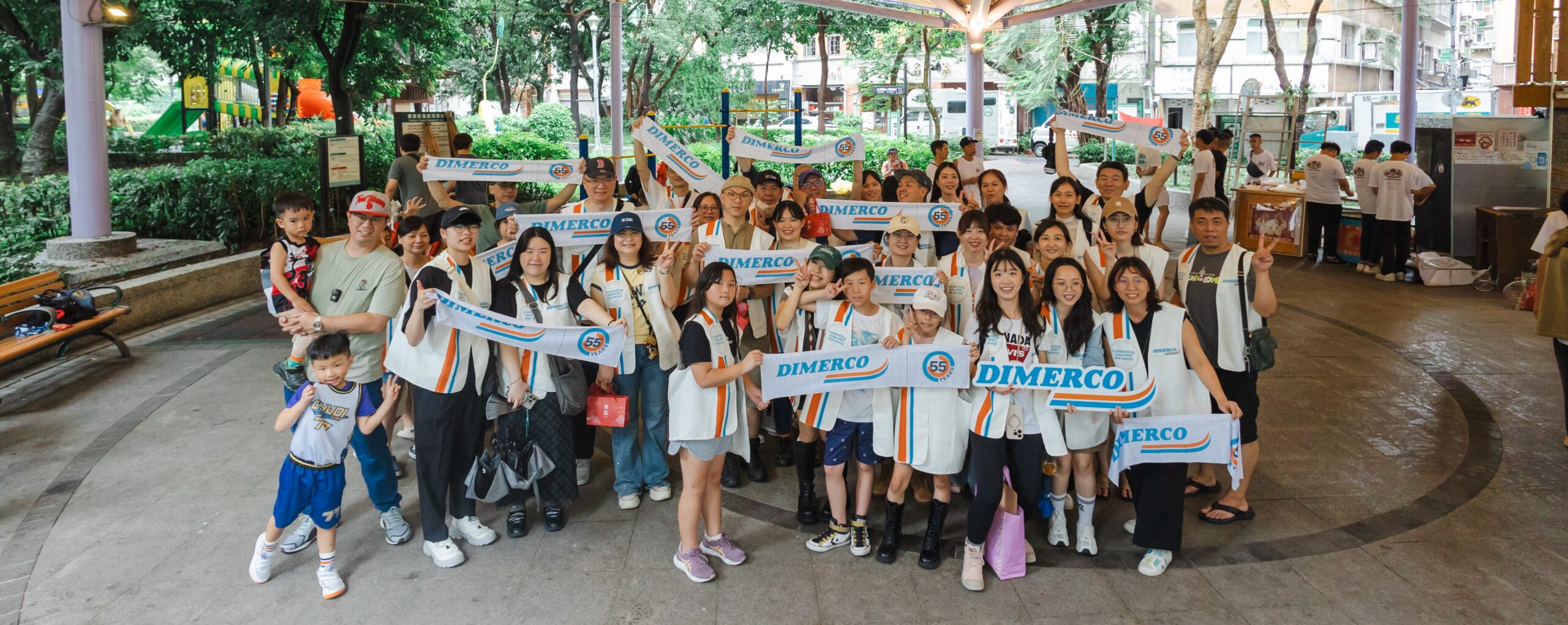 Dimerco employees and families gathering at the June 2026 Dadaocheng community event in Taipei