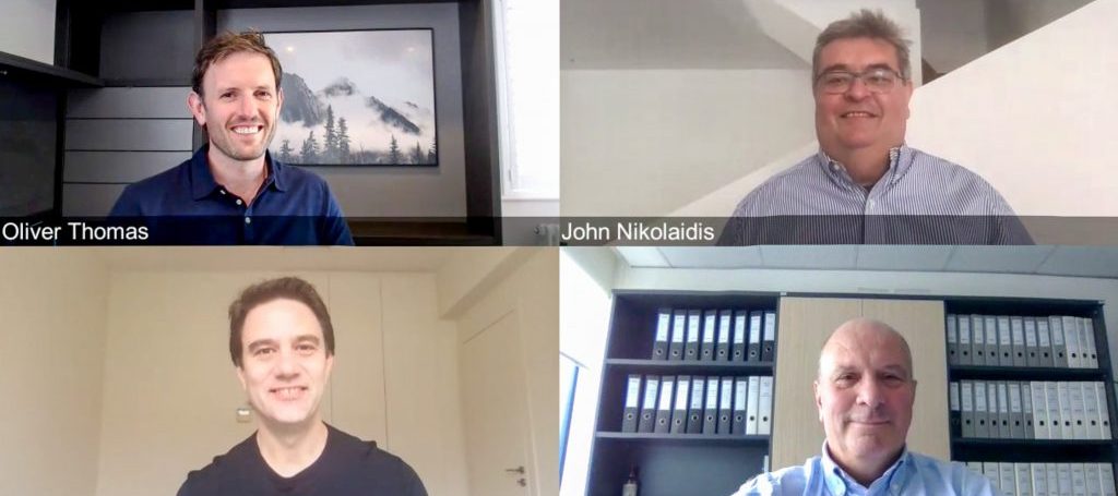 Video-call image showing Oliver Thomas, John Nikolaidis and Omilia’s founding team, including Dimitris Vassos