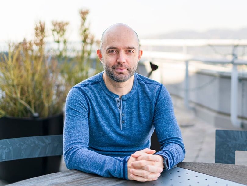 DISQO co-founder and CEO Armen Adjemian seated outdoors