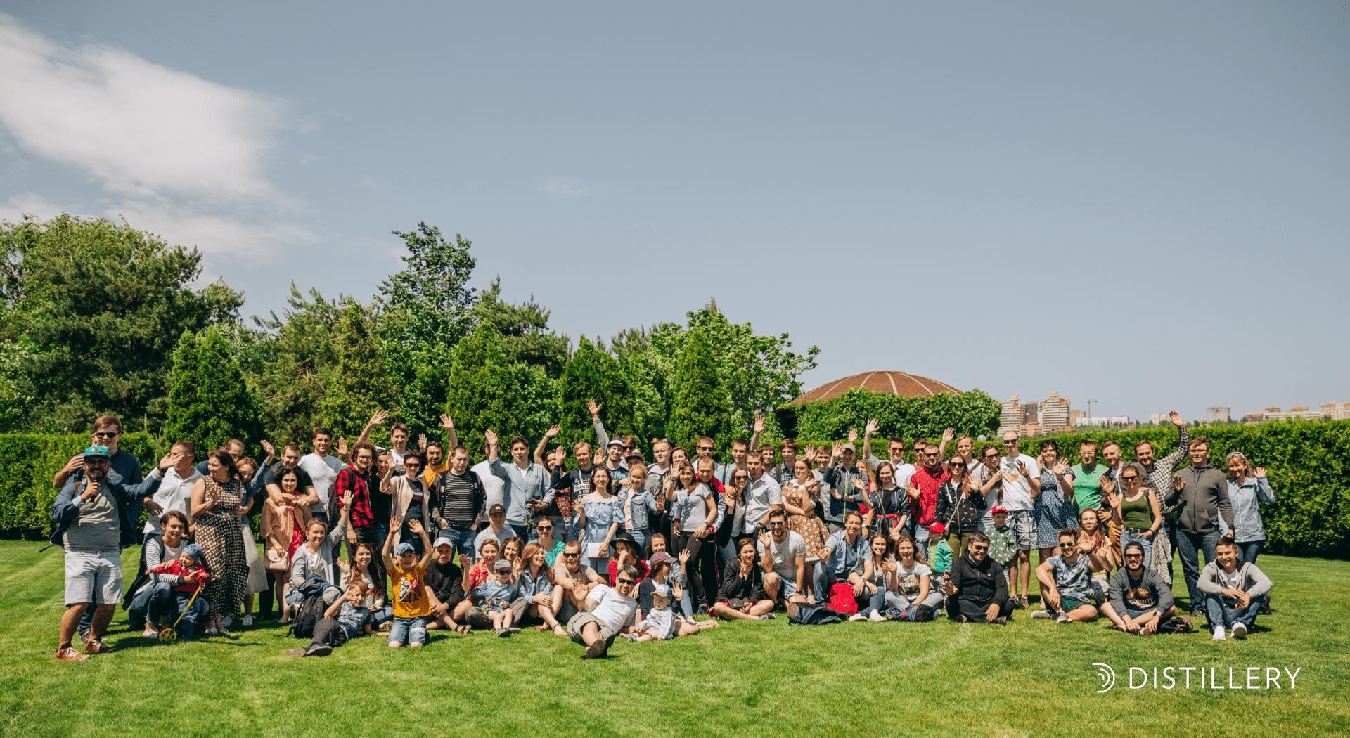 An archival Distillery team gathering outdoors on a lawn