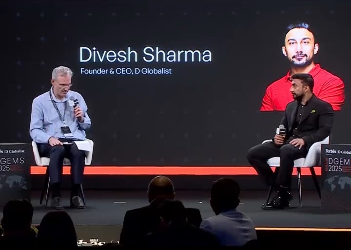 Ron Levin, left, and Divesh Sharma, right, seated onstage during their DGEMS 2025 fireside chat