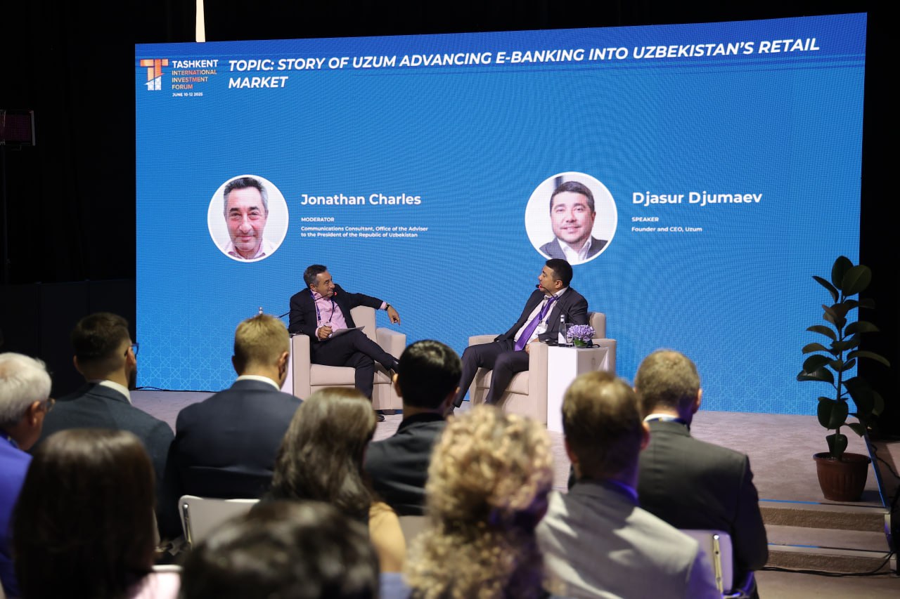 Djasur Djumaev, right, speaking with Jonathan Charles at the Tashkent International Investment Forum in June 2025