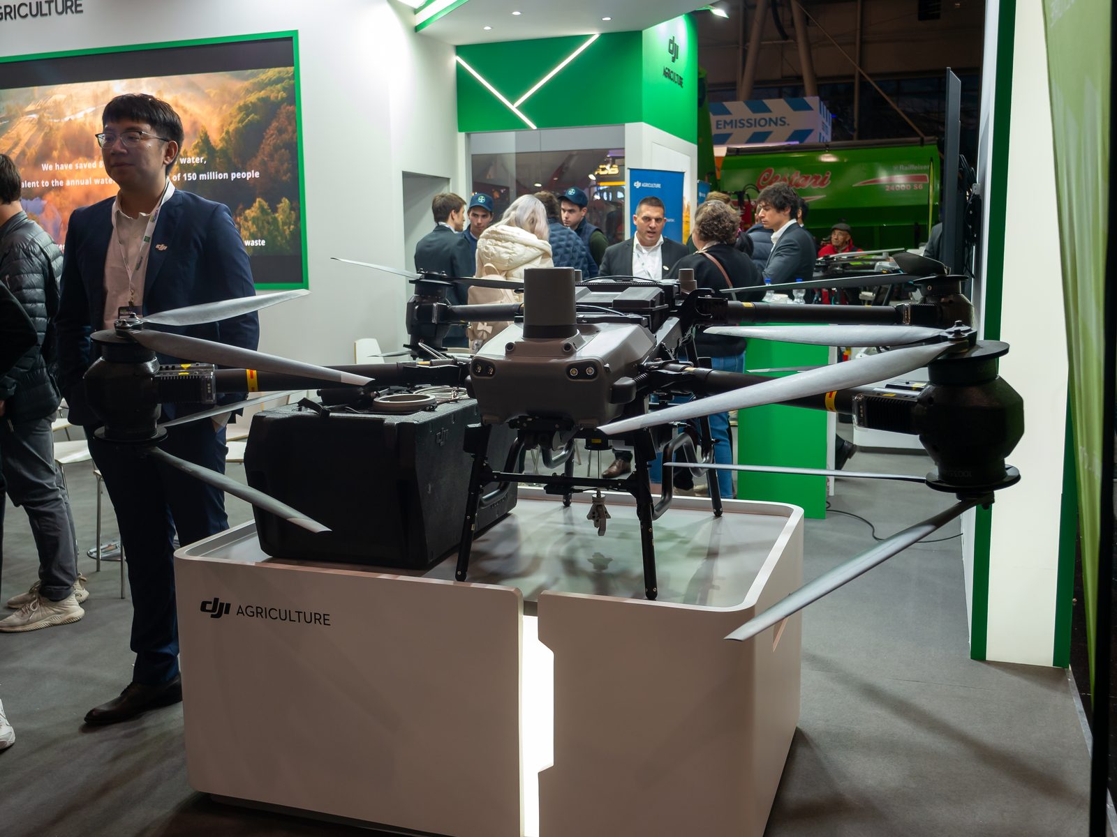 A DJI Agras agricultural spraying drone on display