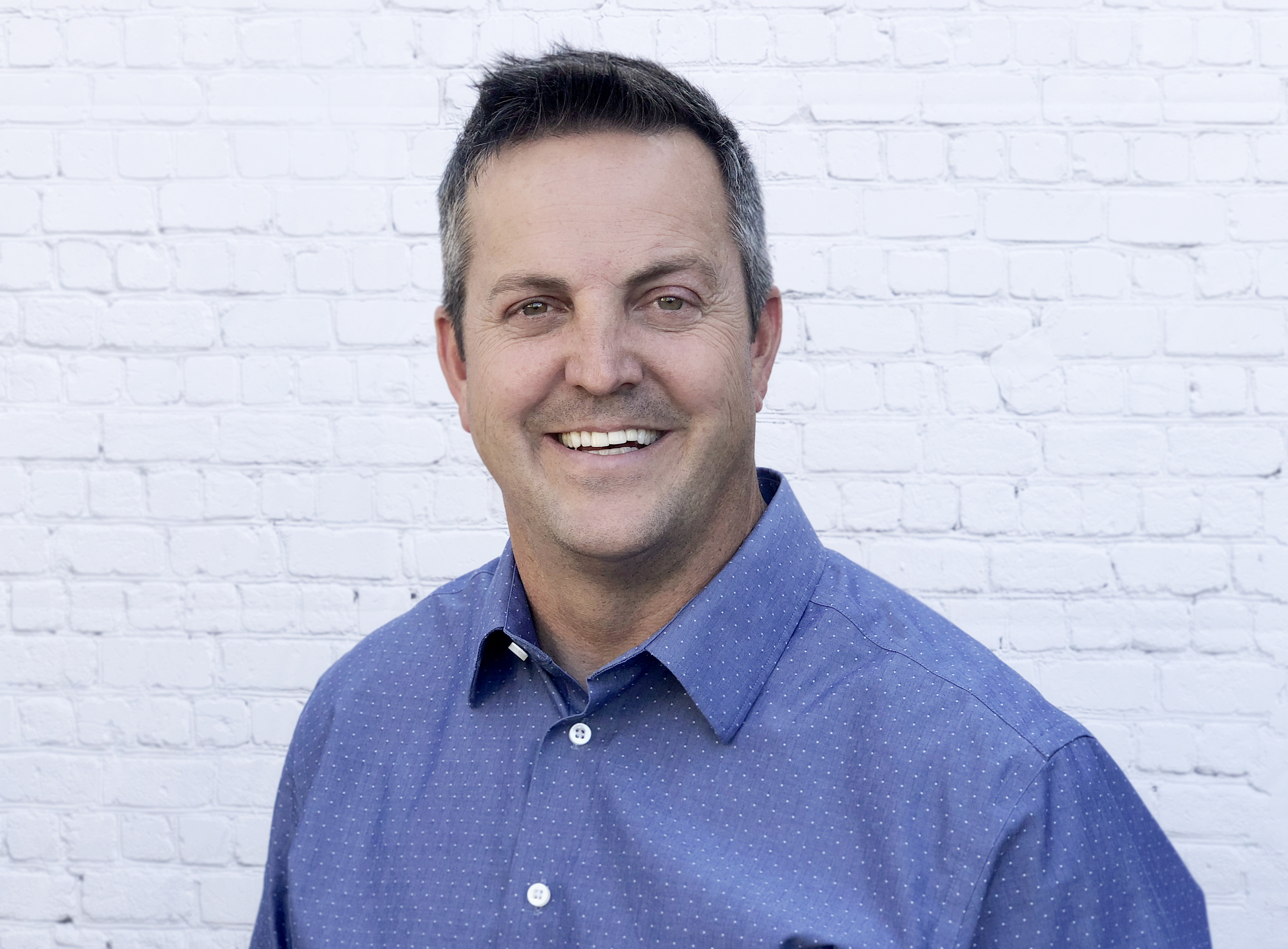 Portrait of DK Global founder and CEO Michael Caldwell