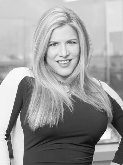 Black-and-white portrait of DMH Americas founder Daniela Martucci