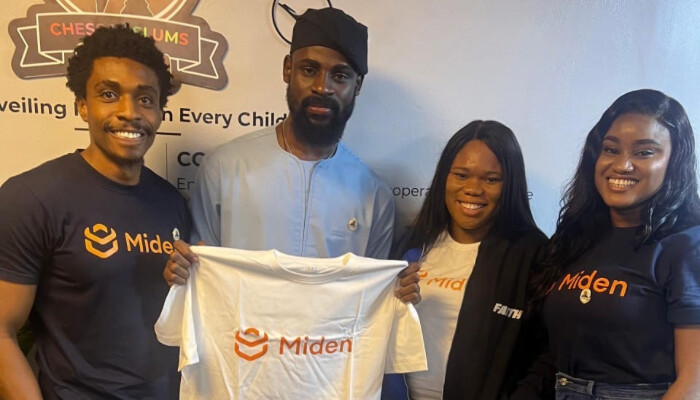 Representatives of Miden and Chess in Slums Africa at their education partnership event