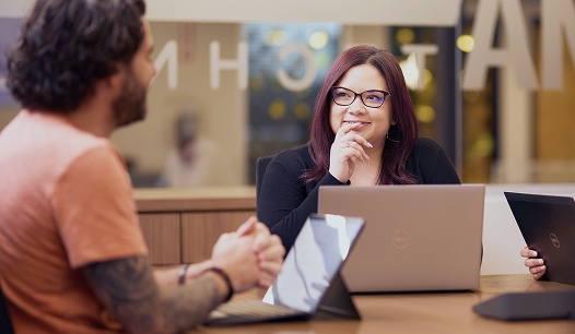 Commence colleagues working together in an office