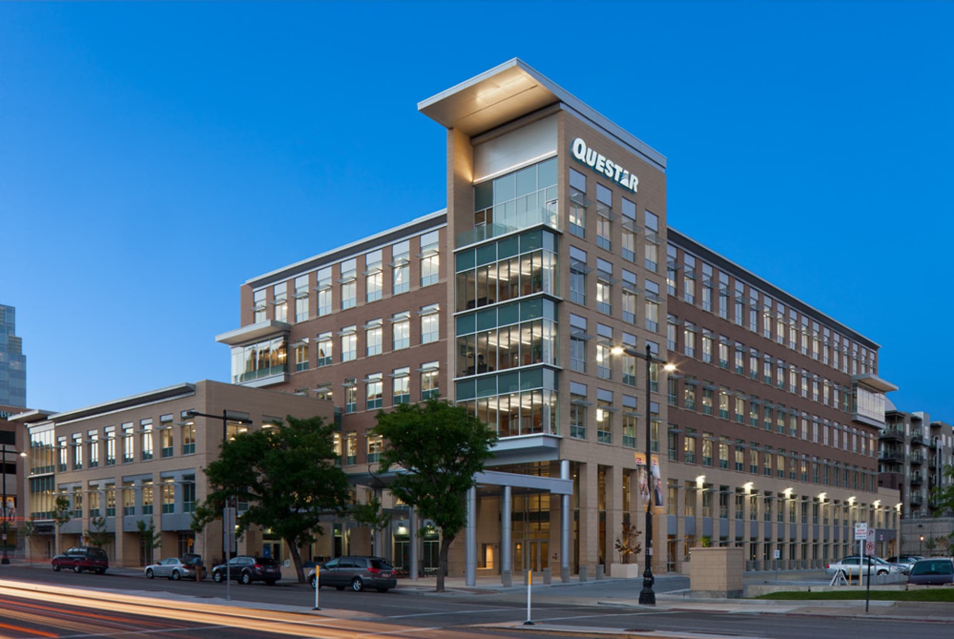 Questar’s brick and glass headquarters in Salt Lake City, photographed with its historical Questar sign