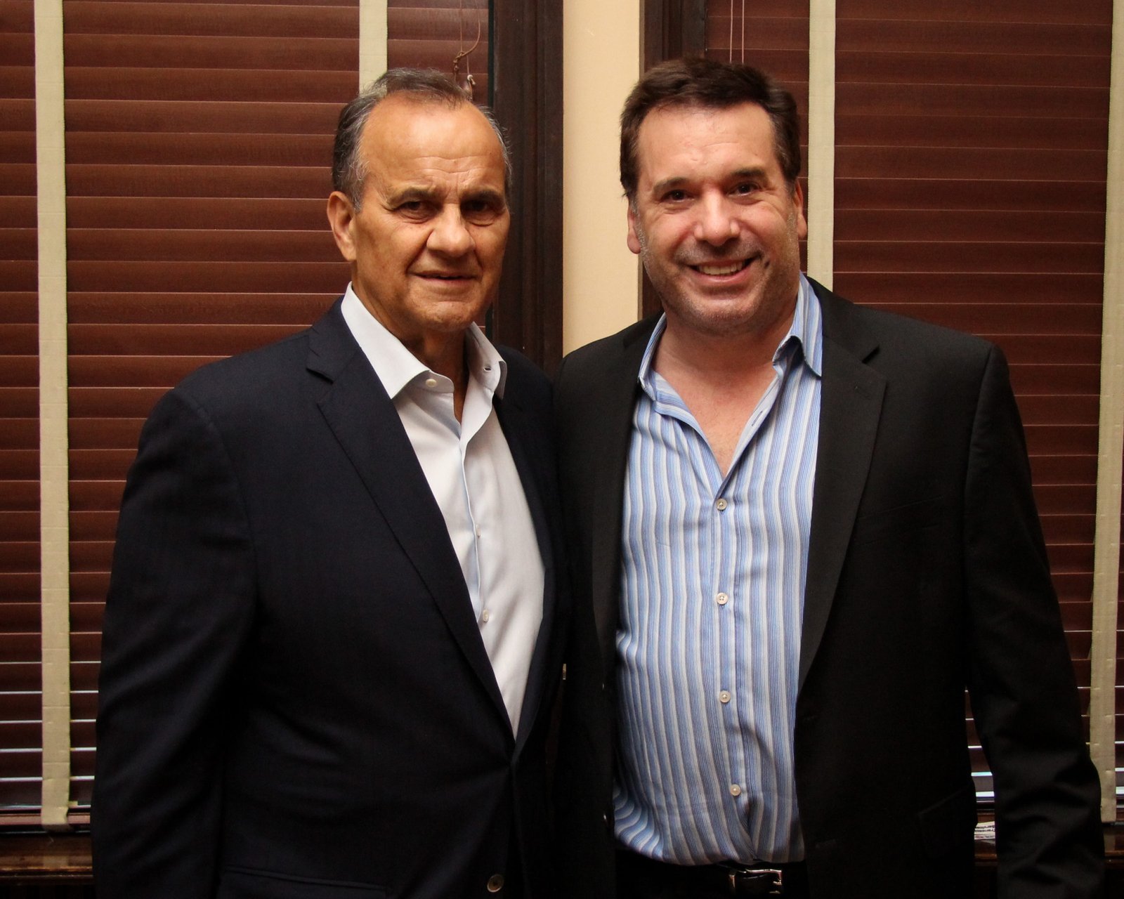 Joe Torre, left, standing beside Don Vaccaro