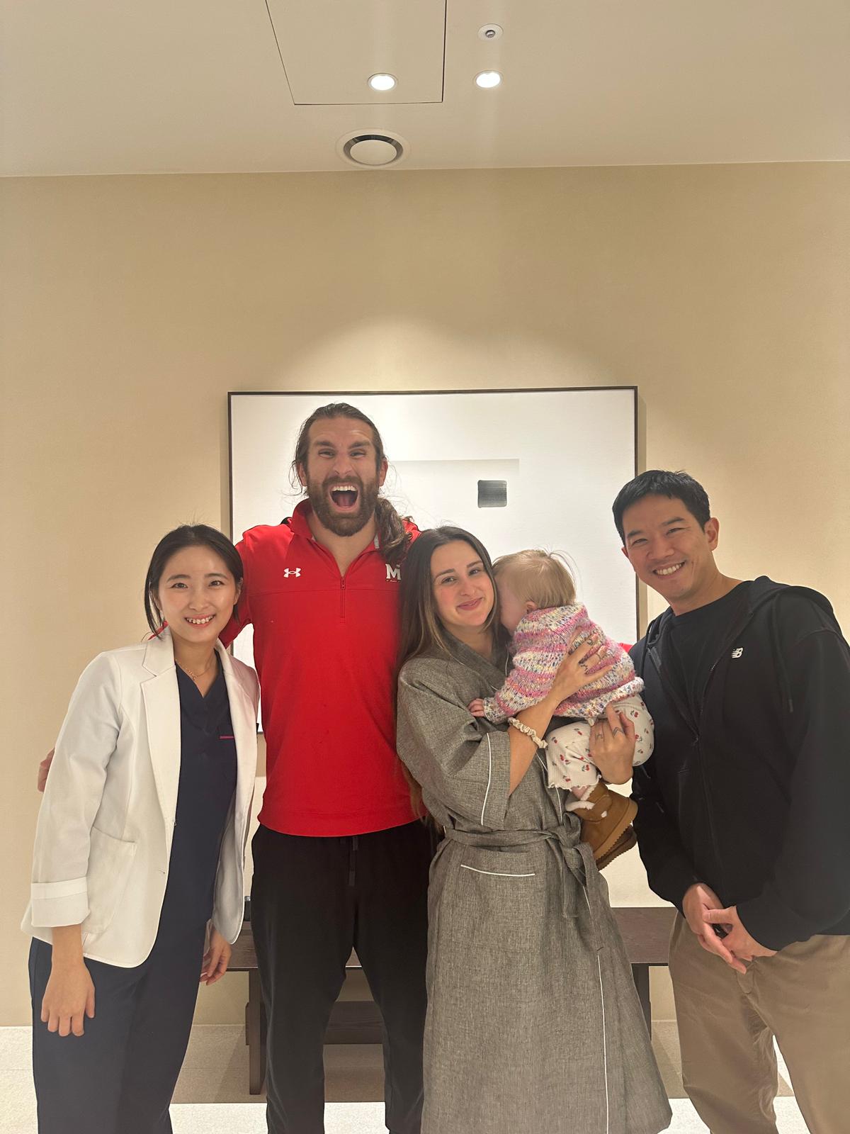 Donkyo Seo, at right, visiting thekyeol clinic with the clinic team and guests