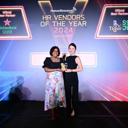 Dorothy Yiu, on the right, holding an award at the HR Vendors of the Year 2024 Singapore ceremony