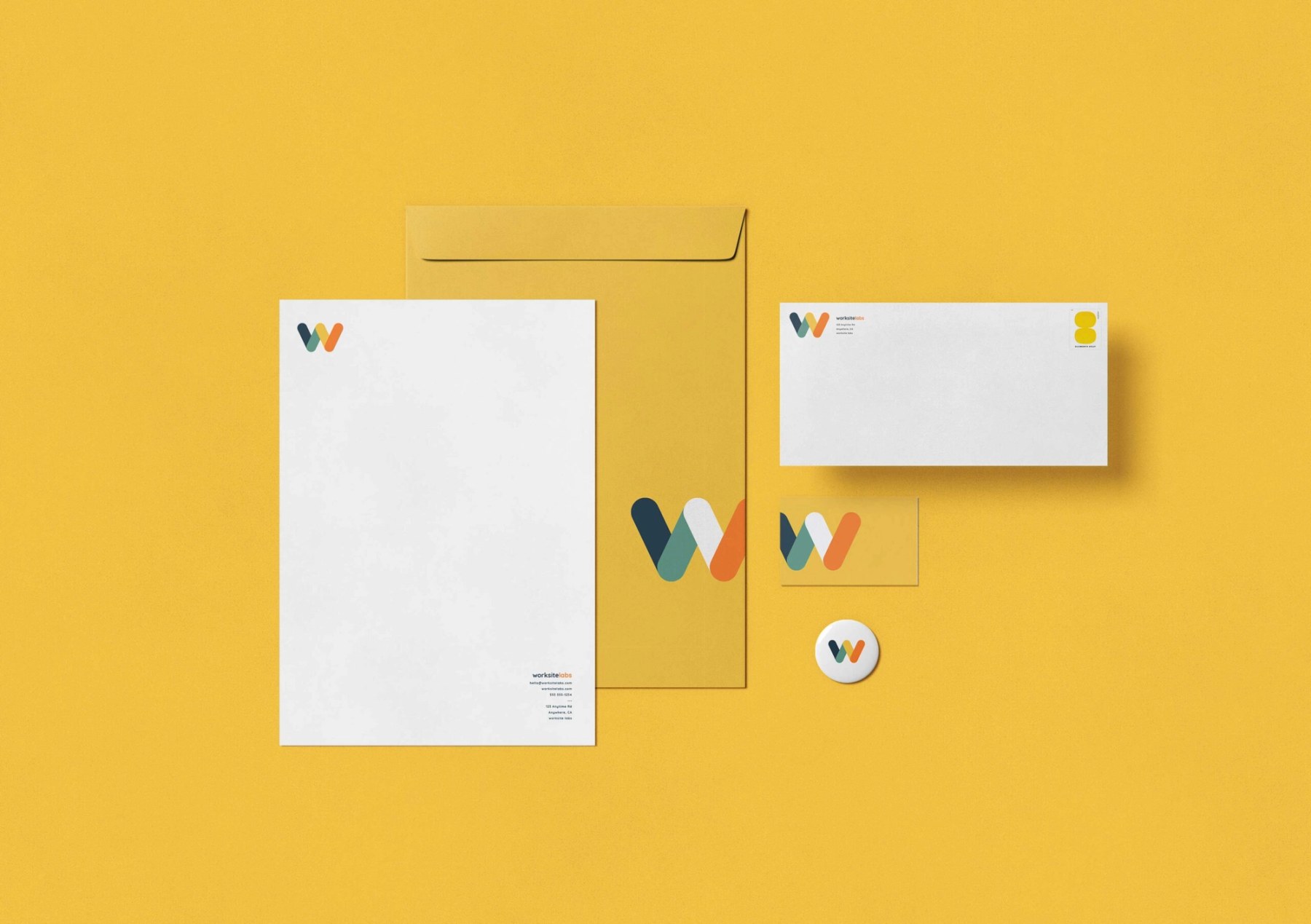 Worksite Labs stationery and brand materials designed by Dotted Line Agency on a yellow background